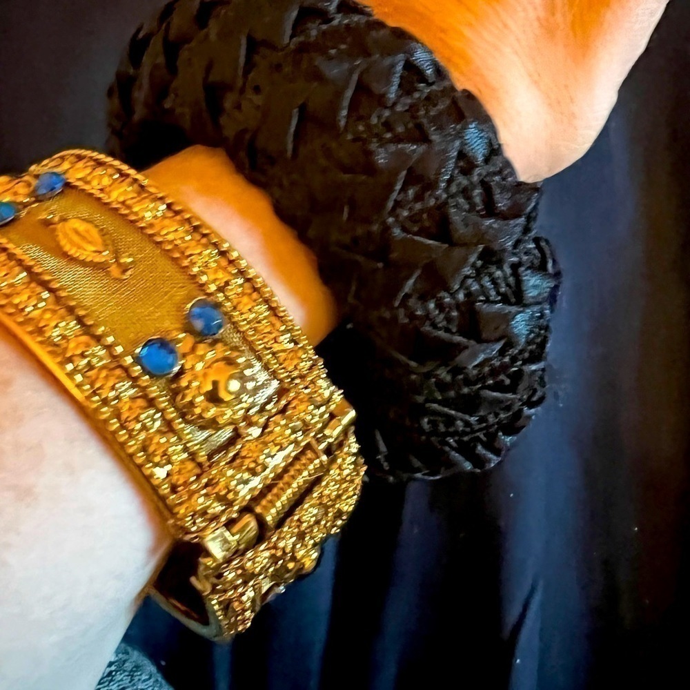 Two fun costume bangles! Gold toned metal “crown” with hinge and black fabric